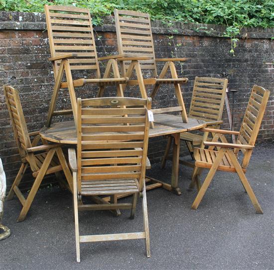 Large oak garden table & 6 reclining chairs